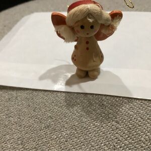 Vintage Scandinavian Angel kneeling down.  She has light hair  pre-owned.